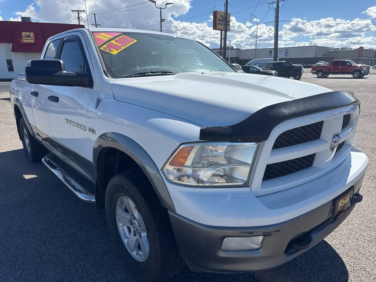 2011 RAM 1500 Outdoorsman 4x4 4dr Quad Cab 6.3 ft. SB Pickup