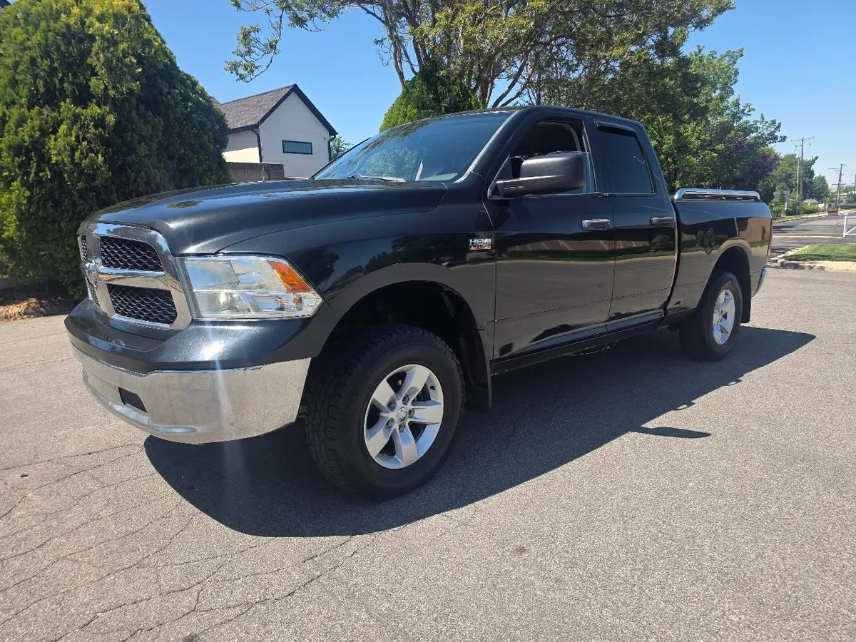 2015 RAM 1500 4WD Quad Cab 140.5" ST